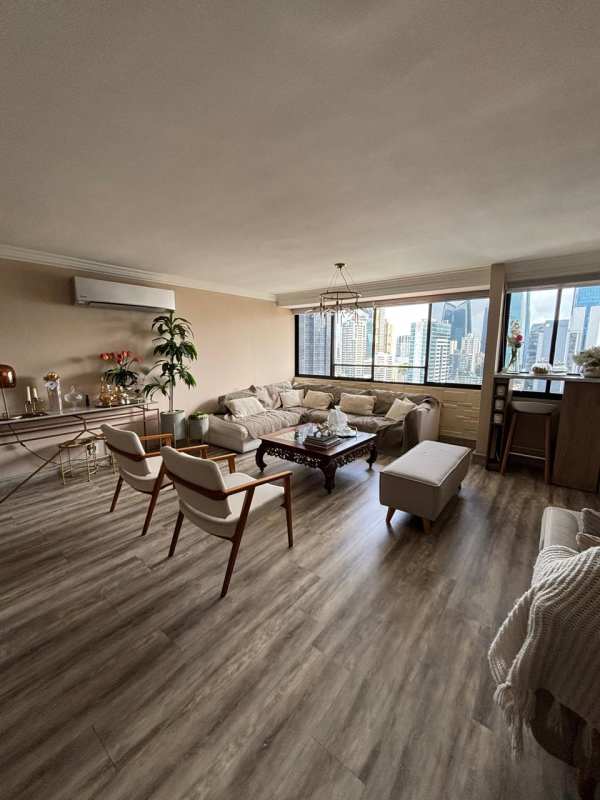 Equipped kitchen with granite counters and appliances at PH Marbella Tower Panama City