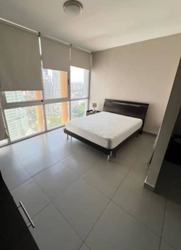Modern bedroom with floor-to-ceiling windows and wardrobe in PH Bellavista Tower Panama City