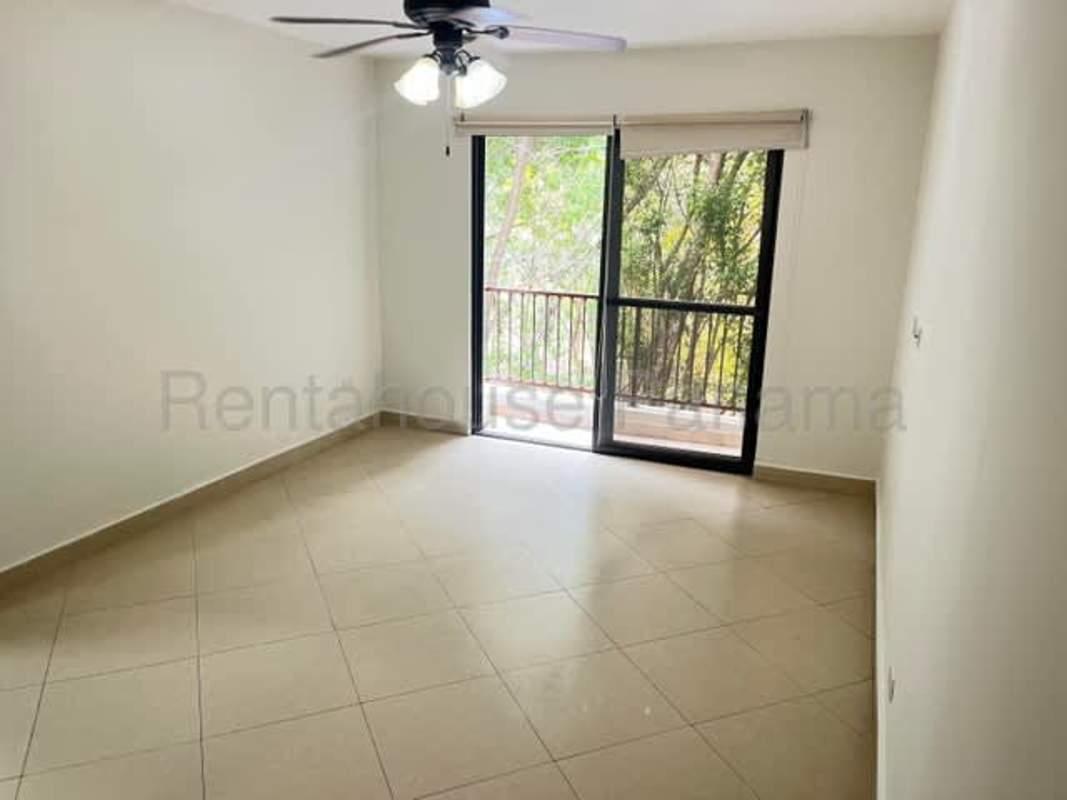 Bright bedroom suite with closet, large windows and garden view in Embassy Club Clayton Panama