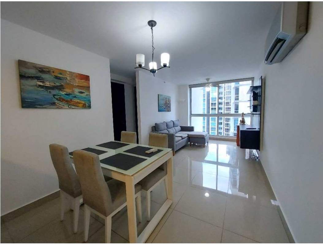 Bright living and dining room with balcony, furnished, in PH Coral Towers Panama City