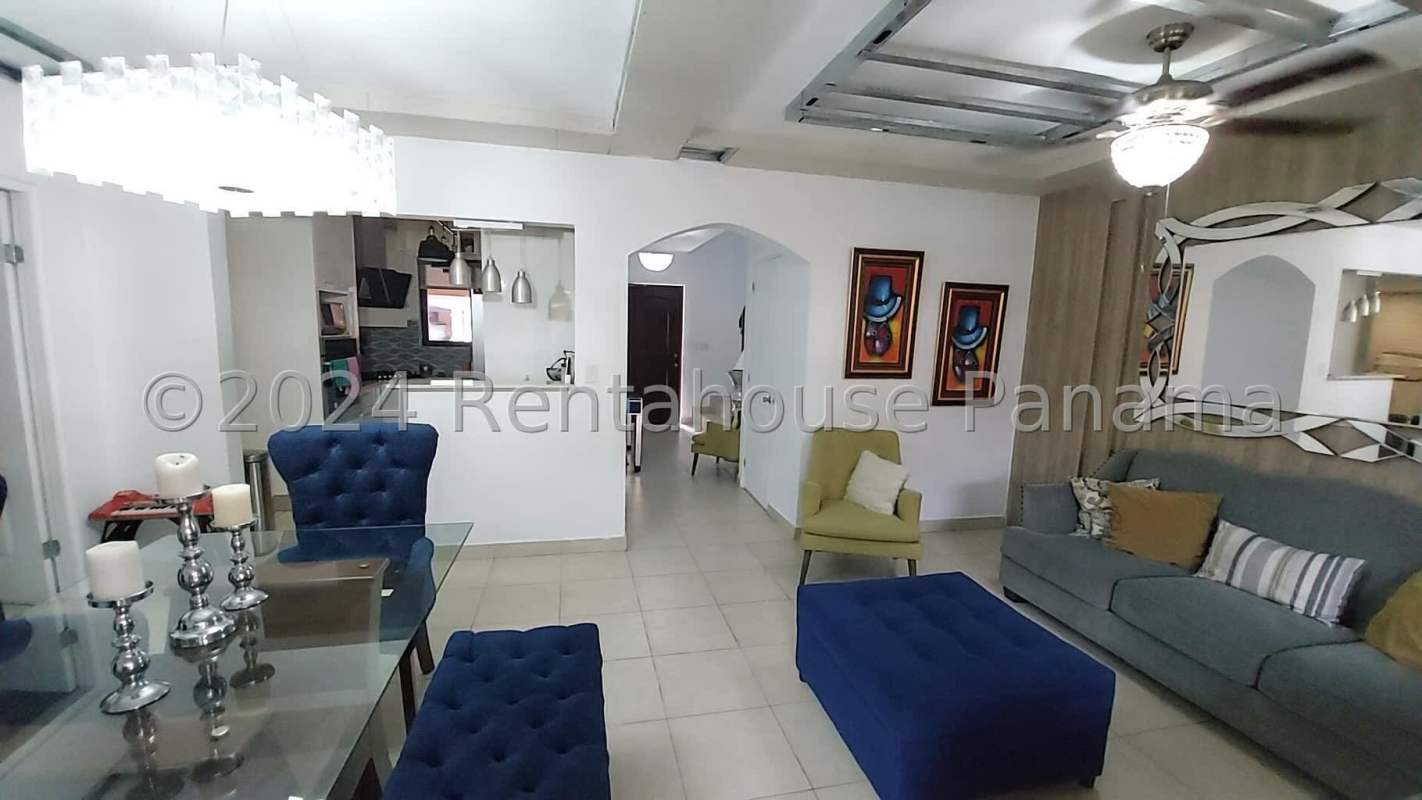 Kitchen with white cabinets stone countertop modern appliances PH Versalles Panama