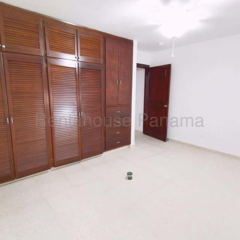 Bathroom with glass shower enclosure, vanity bowl sink and ceramic tiles in Costa del Este home