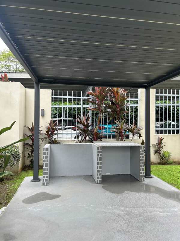 Spacious living and dining room with access to balcony, tiled floors in PH Rokas Condado del Rey Panama