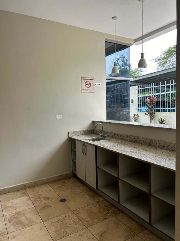 Modern gym with cardio and strength training equipment at PH Rokas Condado del Rey Panama