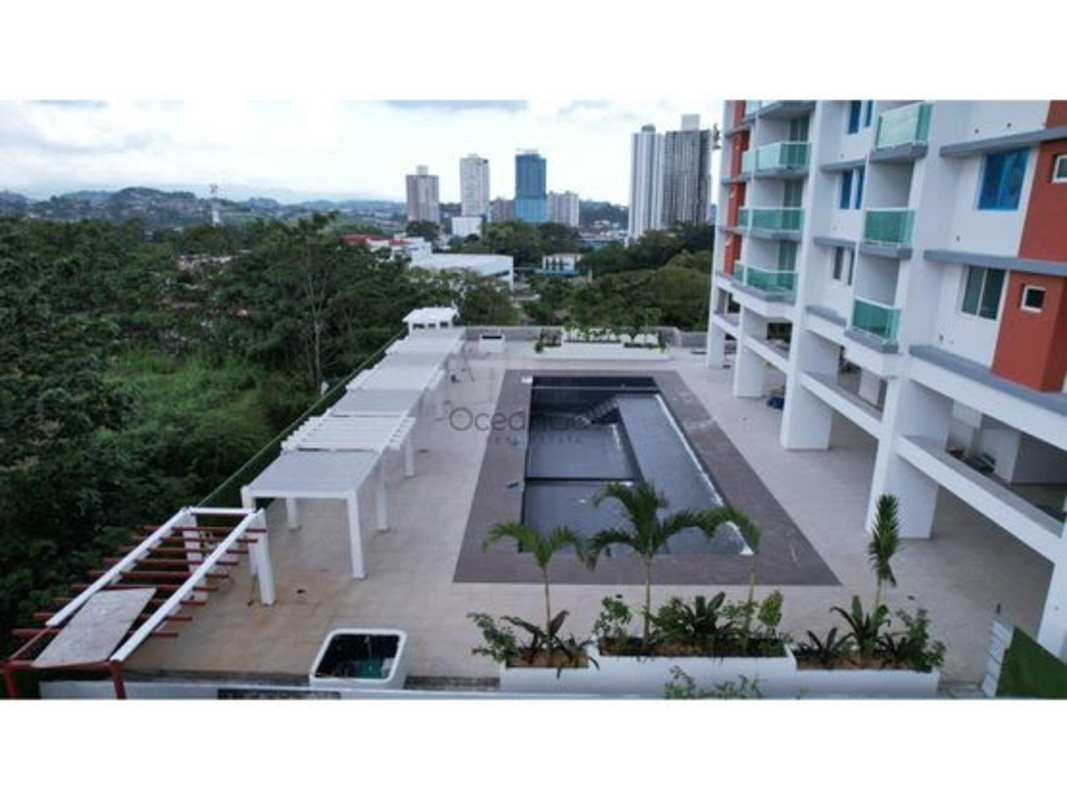 Modern residential condominium with swimming pool and pergolas at PH Mi Condado Condado del Rey Panama City