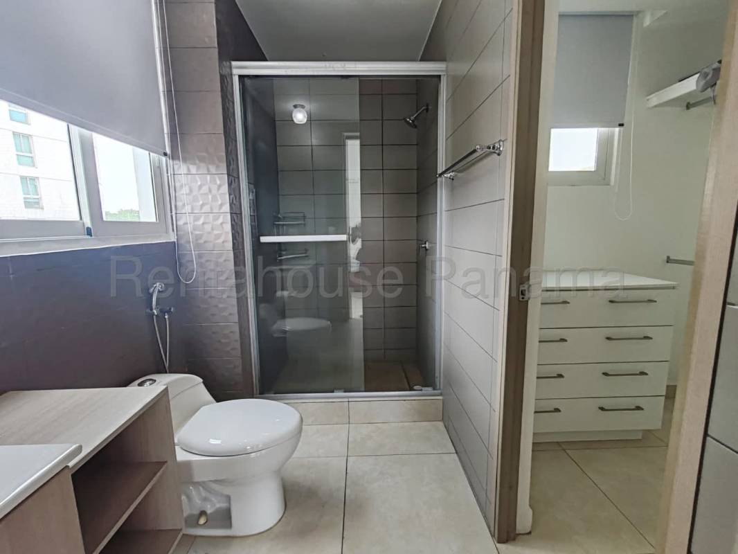 Bathroom with glass shower, window, modern vanity, Clayton Park II apartment Panama