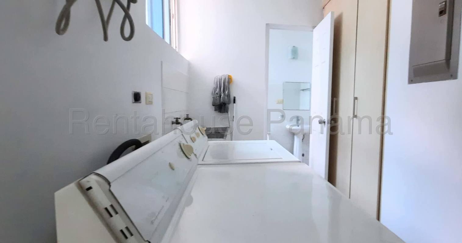 Modern bathroom with glass shower and granite vanity in Costa del Este Panama