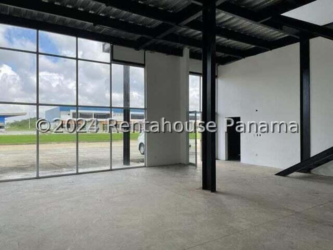 Open interior view industrial warehouse with metal structures and polished concrete floor in Pacora Panama