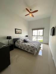 Modern residential condominium Panama Pacifico with garden and commercial plaza