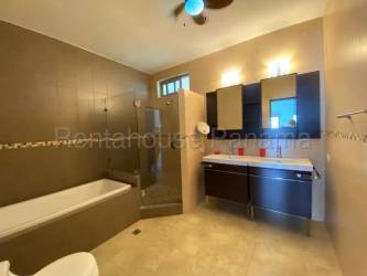 Modern bathroom with double vanity, walk-in shower apartment rental Panama Pacifico