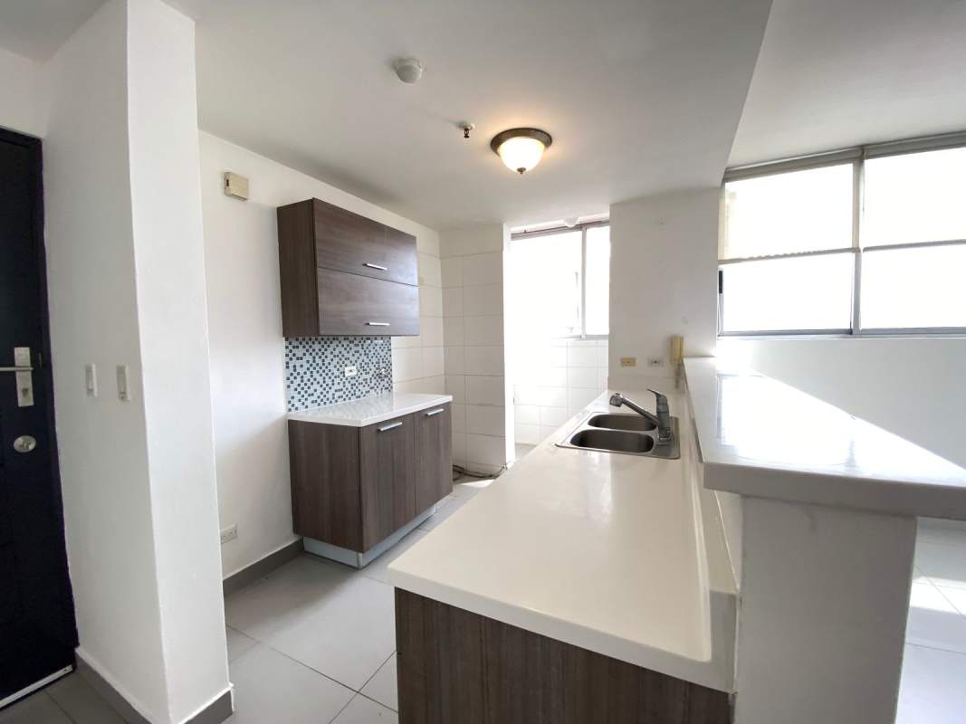 Contemporary kitchen with mosaic backsplash, breakfast bar, wood cabinets, PH Trio El Carmen Panama