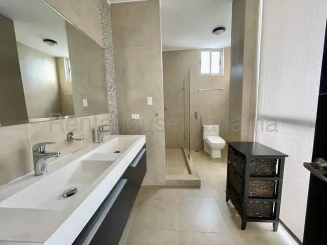 Modern double sink bathroom with walk-in glass shower PH San Francisco Bay Panama