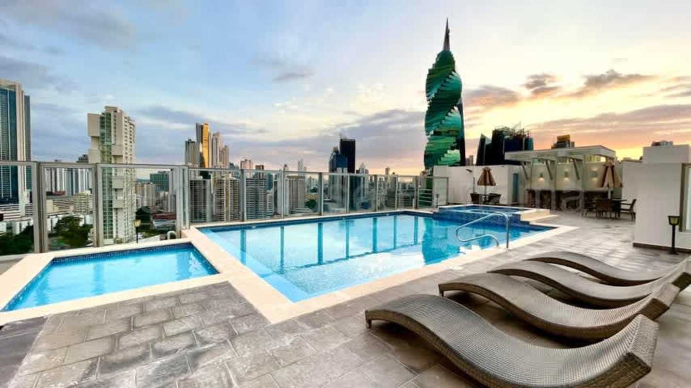 Skyline view rooftop infinity pool lounge chairs PH San Francisco Bay Panama