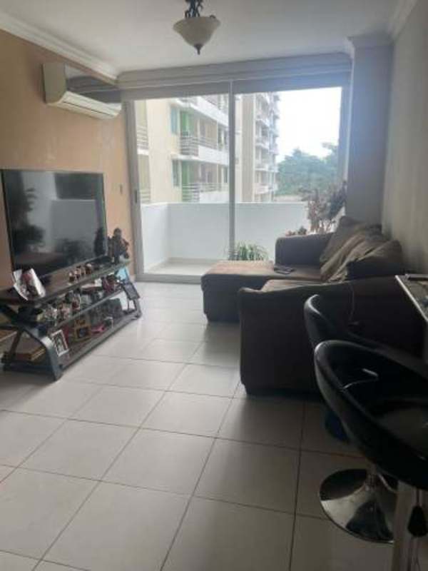 Two outdoor swimming pools with surrounding gazebos and gardens at PH Green Park Condado del Rey Panama City