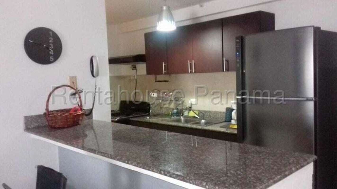 Compact kitchen with granite countertop and cabinets PH Altavista Tower Condado del Rey