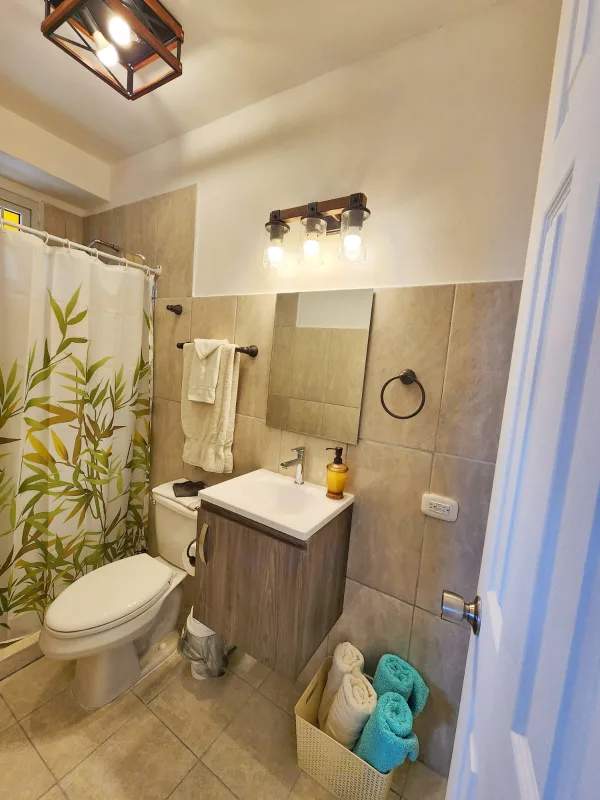 Ocean view terrace with colorful seating at Cerrito Tropical boutique hotel Isla Taboga