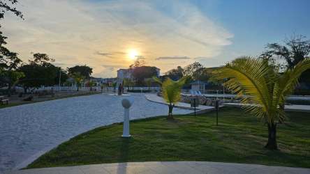 Covered porch entrance and garden area of beach house for rent in Playa Dorada Panama