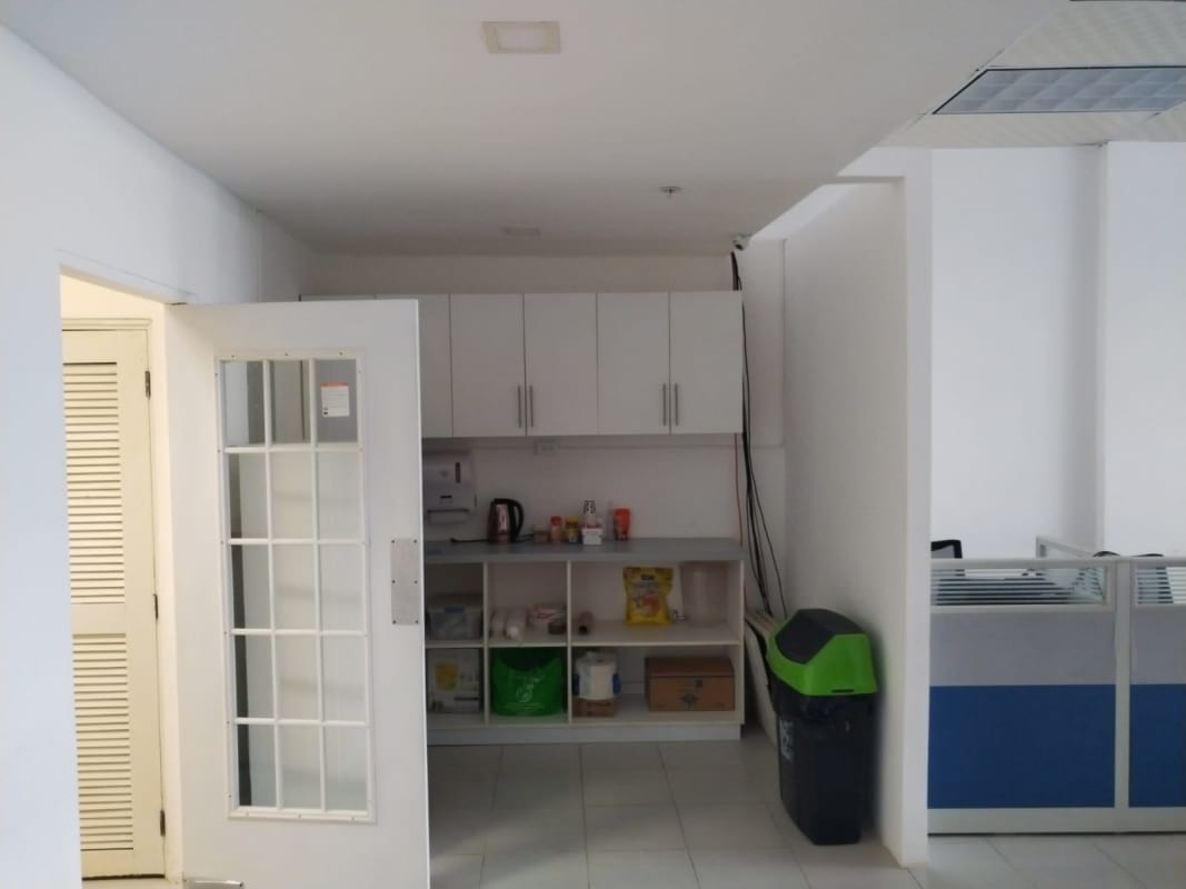 Small kitchenette pantry with cabinets, storage and partition wall in commercial unit Brisas del Golf Panama City