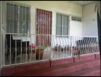 Traditional style porch with tiled steps grill security Santiago Panama