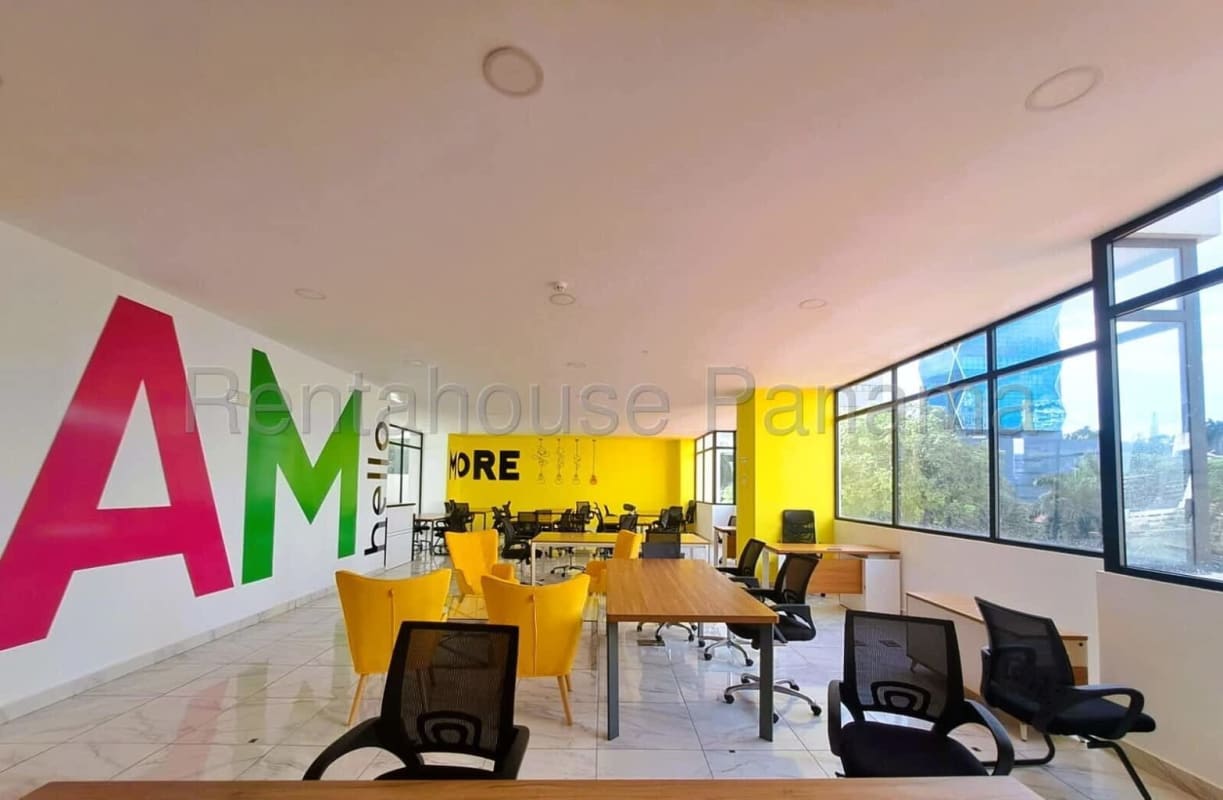 Bedroom with large window, city view, marble tile flooring, TV wall mount PH The Gray Panama City