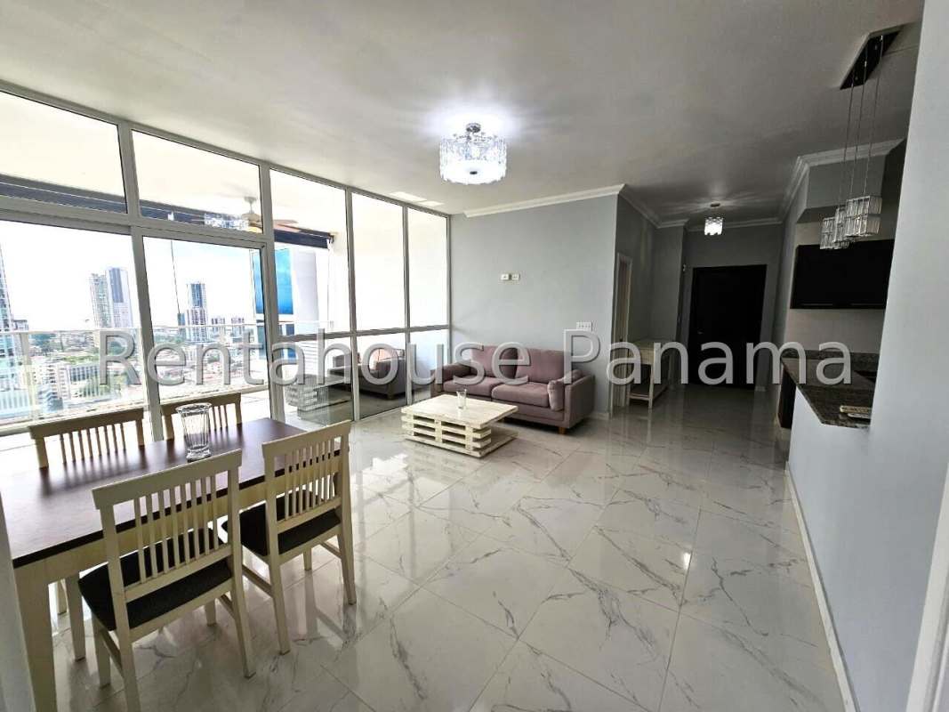 View of PH Quadrat high-rise condominium with outdoor pool and sun deck in San Francisco Panama