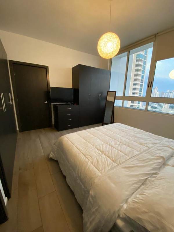 Modern bar with granite counter and mosaic tile accents in PH Quadrat Panama