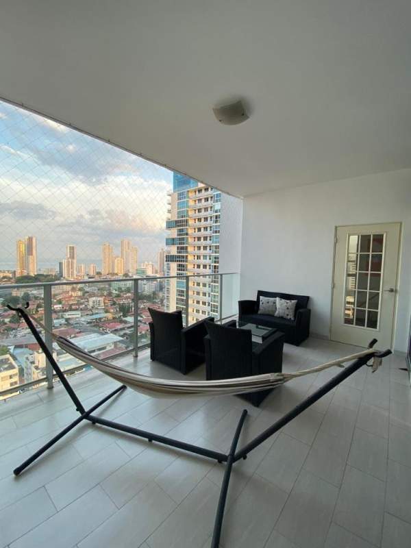 Open kitchen with granite countertops, island bar at PH Quadrat Panama City