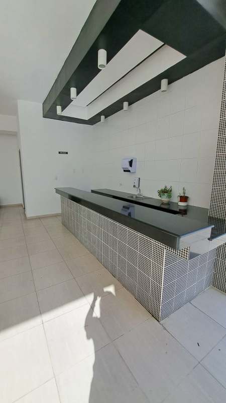 Modern open-plan living with large windows and views in PH Quadrat Panama