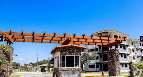 Swimming pool with lounge chairs and palm trees Brisas de Coronado Panama
