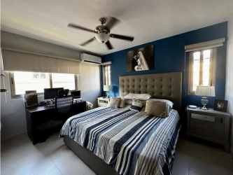 Modern kids bedroom with bunk bed and study space in Woodlands Panama Pacifico