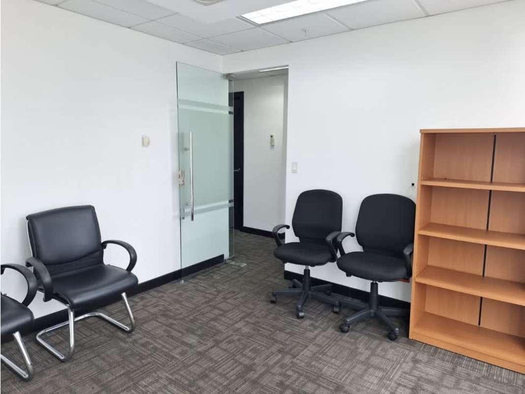 Office kitchenette with cabinets and window view PH BICSA Calle 50 Panama