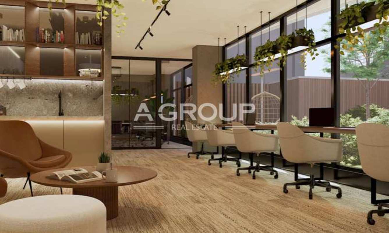 Modern co-working space with lounge seating and natural light at Allure Punta Pacifica