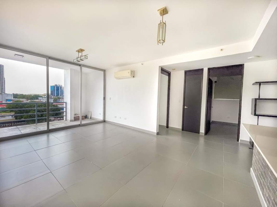 Renovated bathroom with glass shower and geometric tiles at PH Trio Bella Vista Panama