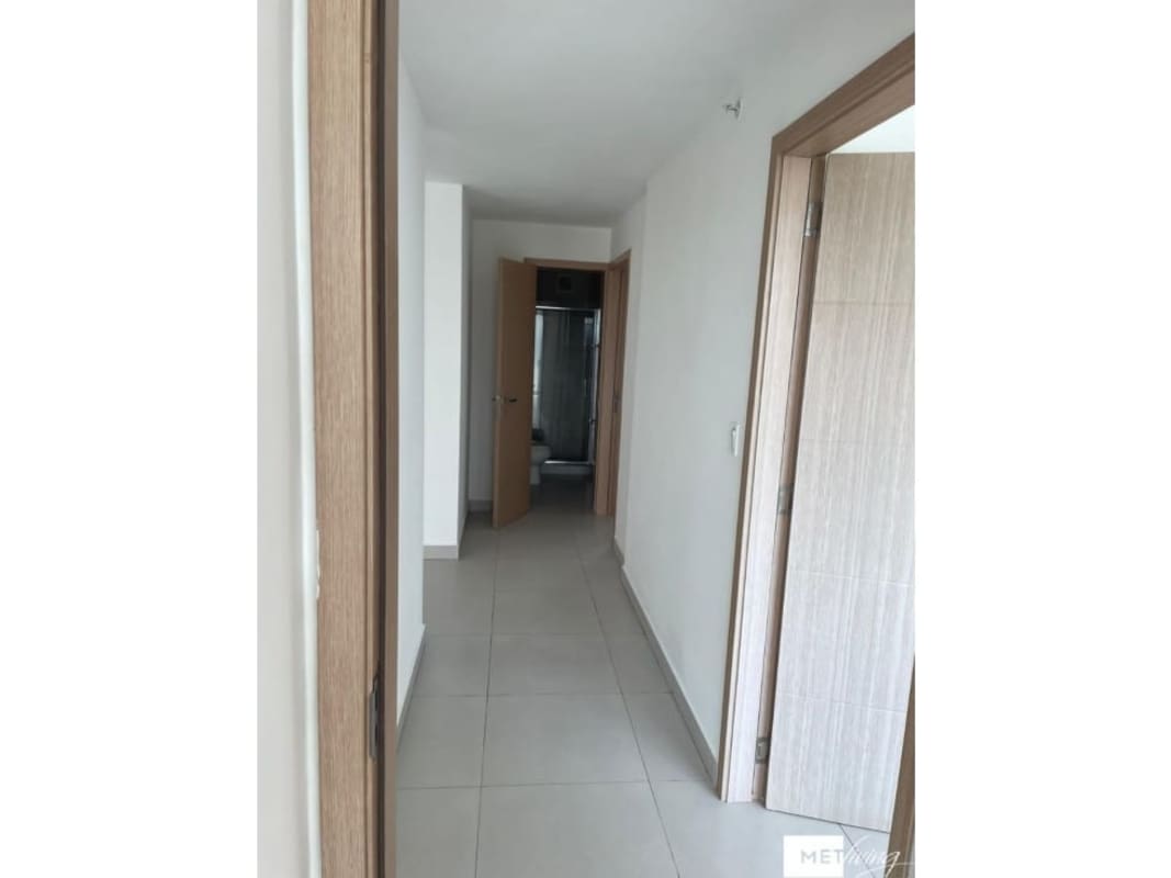 Bedroom filled with natural light through large window with views in PH Altos del Golf Panama City