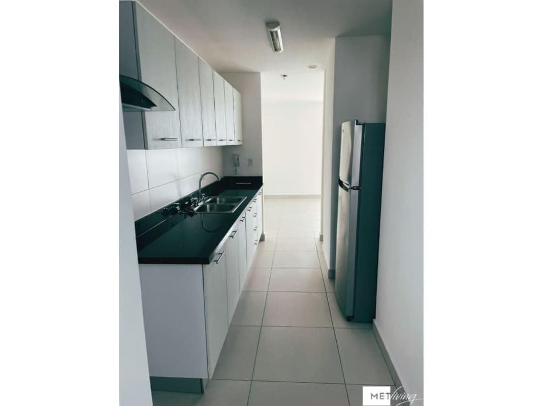 Modern bathroom with granite double vanity, large mirrors and central window in PH Altos del Golf San Francisco Panama