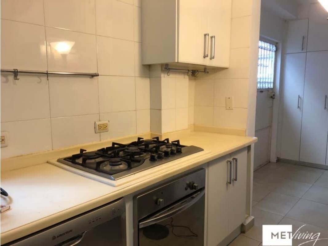 Unfurnished living room with wood floors, barred windows, ceiling fan, Betania La Alameda Panama