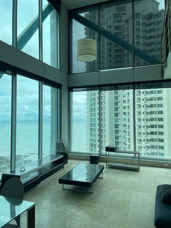 Exterior view of PH Loft Four 41 high-rise condo with glass facade in Punta Pacifica Panama