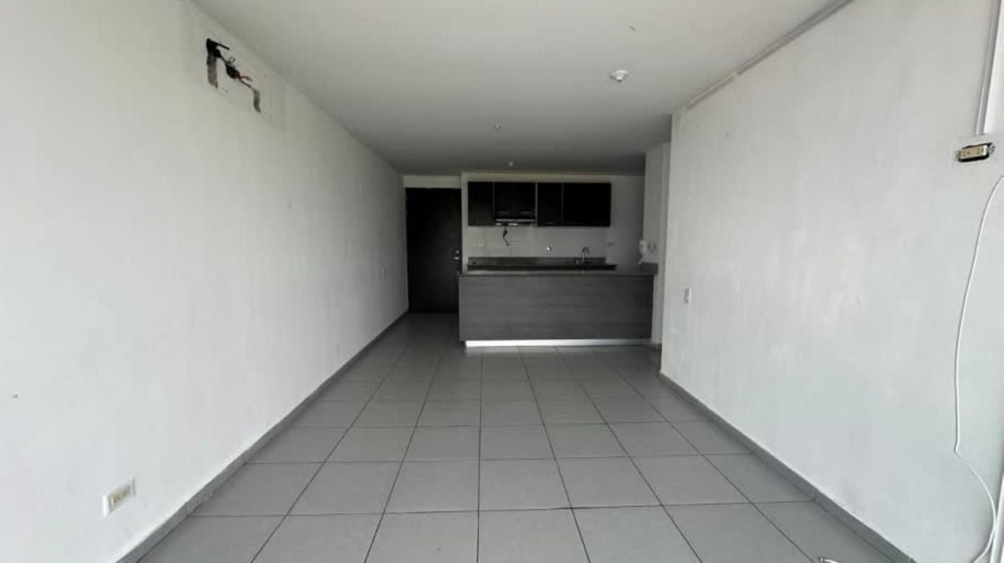 Modern apartment interior open kitchen and living area Condado del Rey Panama