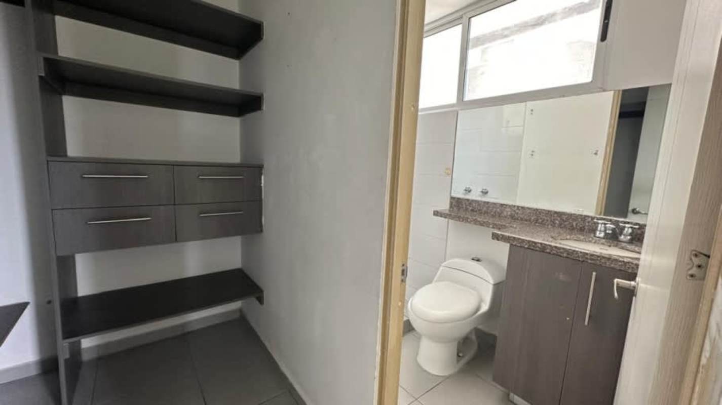 Minimalist bright bedroom with closet in repossessed apartment for sale Panama