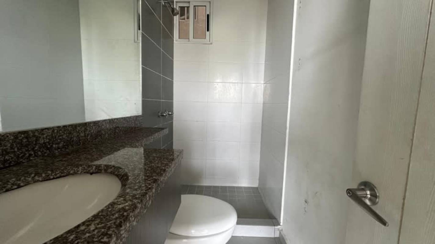Modern bathroom with granite sink and walk-in shower Condado del Rey Panama apartment