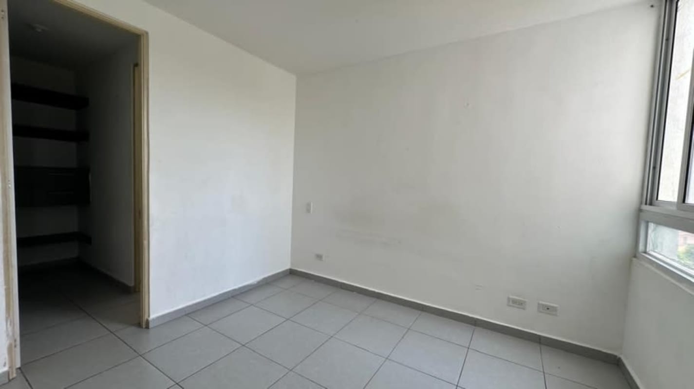 Outdoor area with playground and basketball court at PH Condado del Rey Residences Panama City