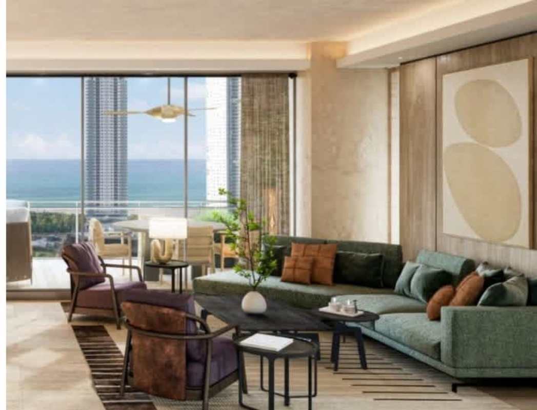 Spacious living room with sectional sofa ocean view balcony PH Madero Costa del Este Panama