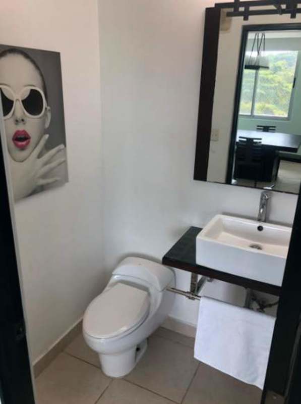 Modern bathroom with vanity and glass shower enclosure PH Clayton Park Clayton Panama City