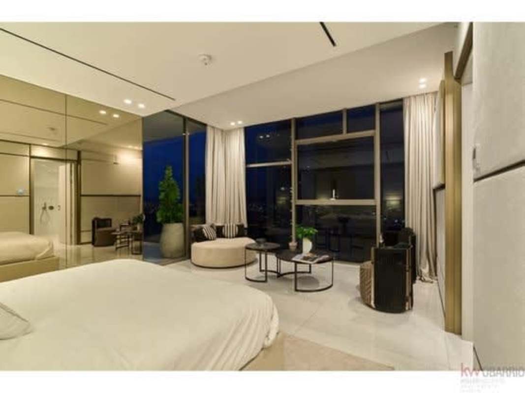 Luxury bedroom with full window wall and sophisticated finishings in PH La Maison Costa del Este Panama