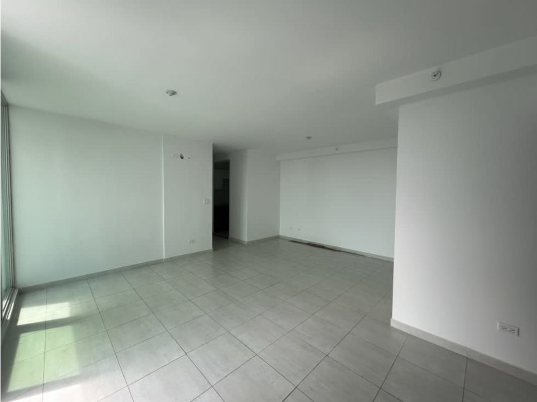 Empty living room with white walls tile floor and large window PH Trinity Tower Panama