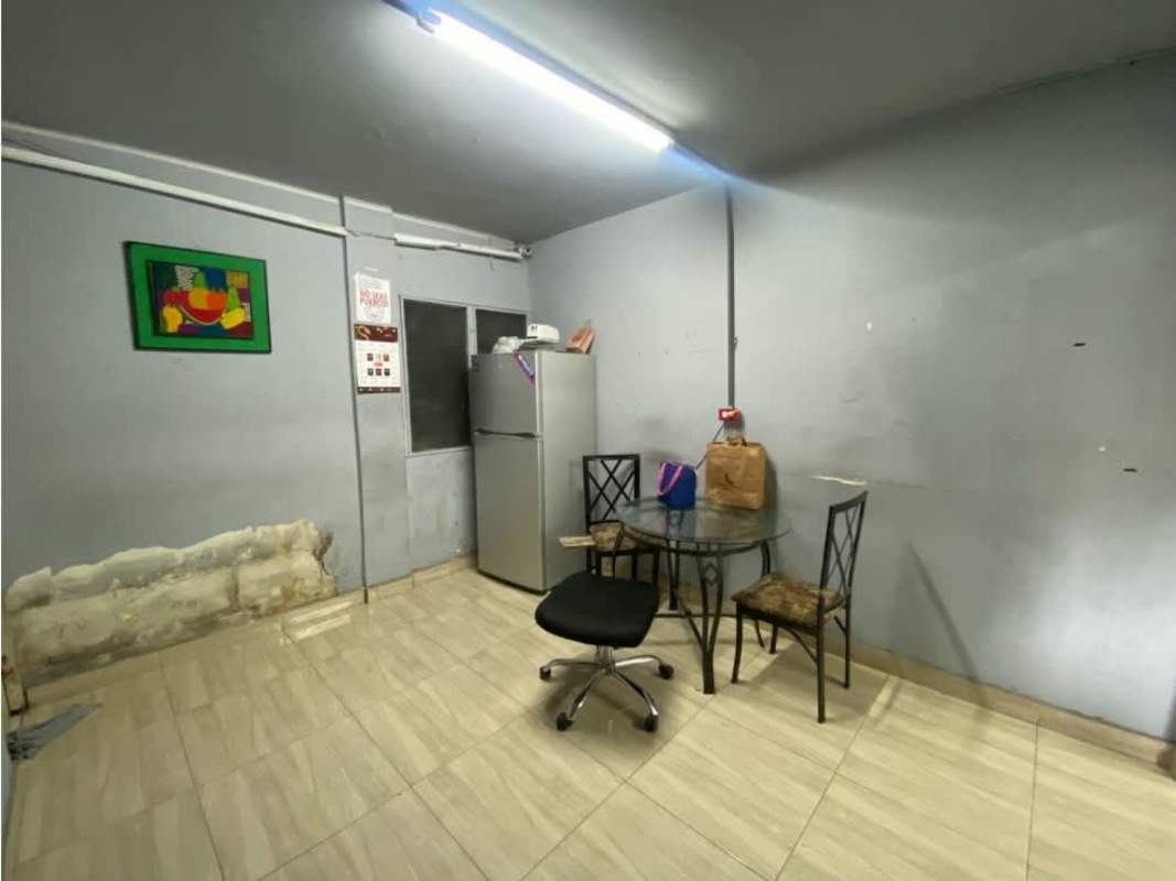 Large open warehouse with industrial printing machines and shelving in Commercial Complex Via Transístmica Panama