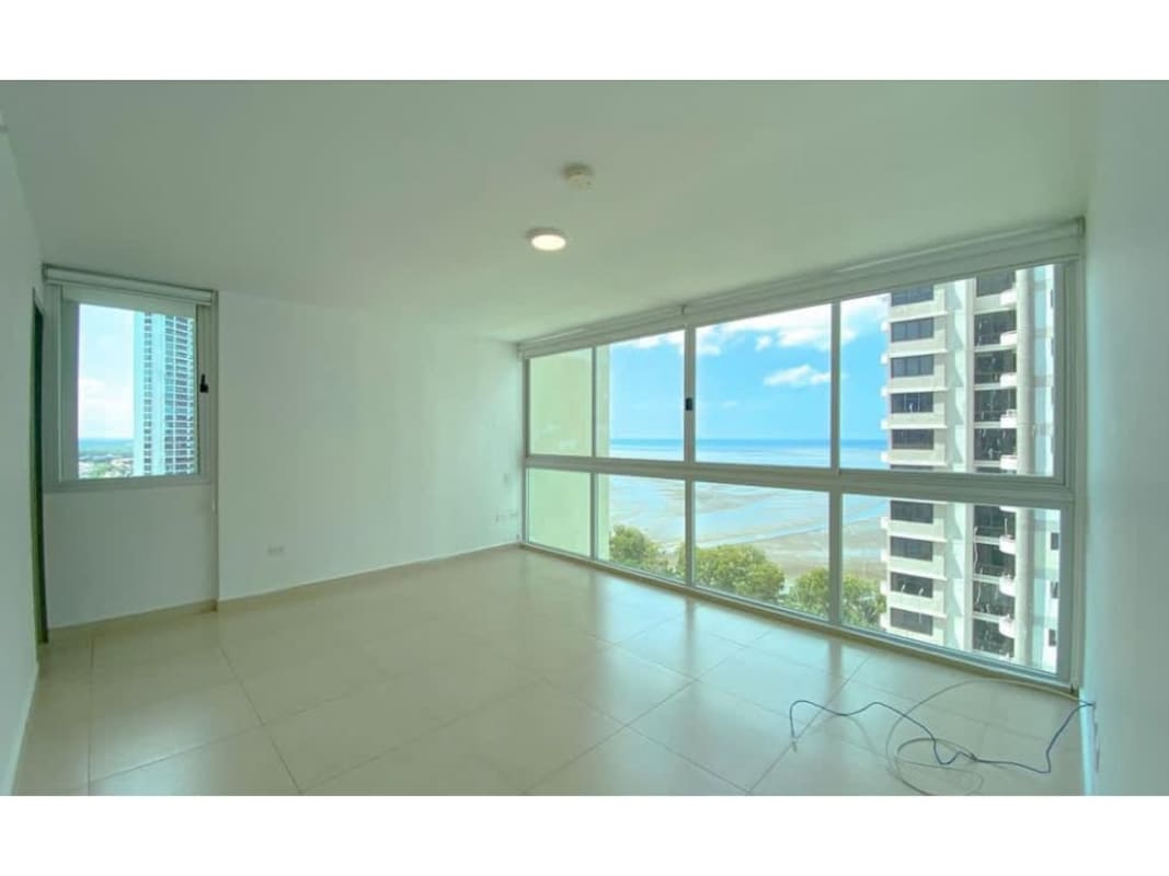 Double-height lobby with water feature stone wall PH Lumiere Costa del Este Panama City