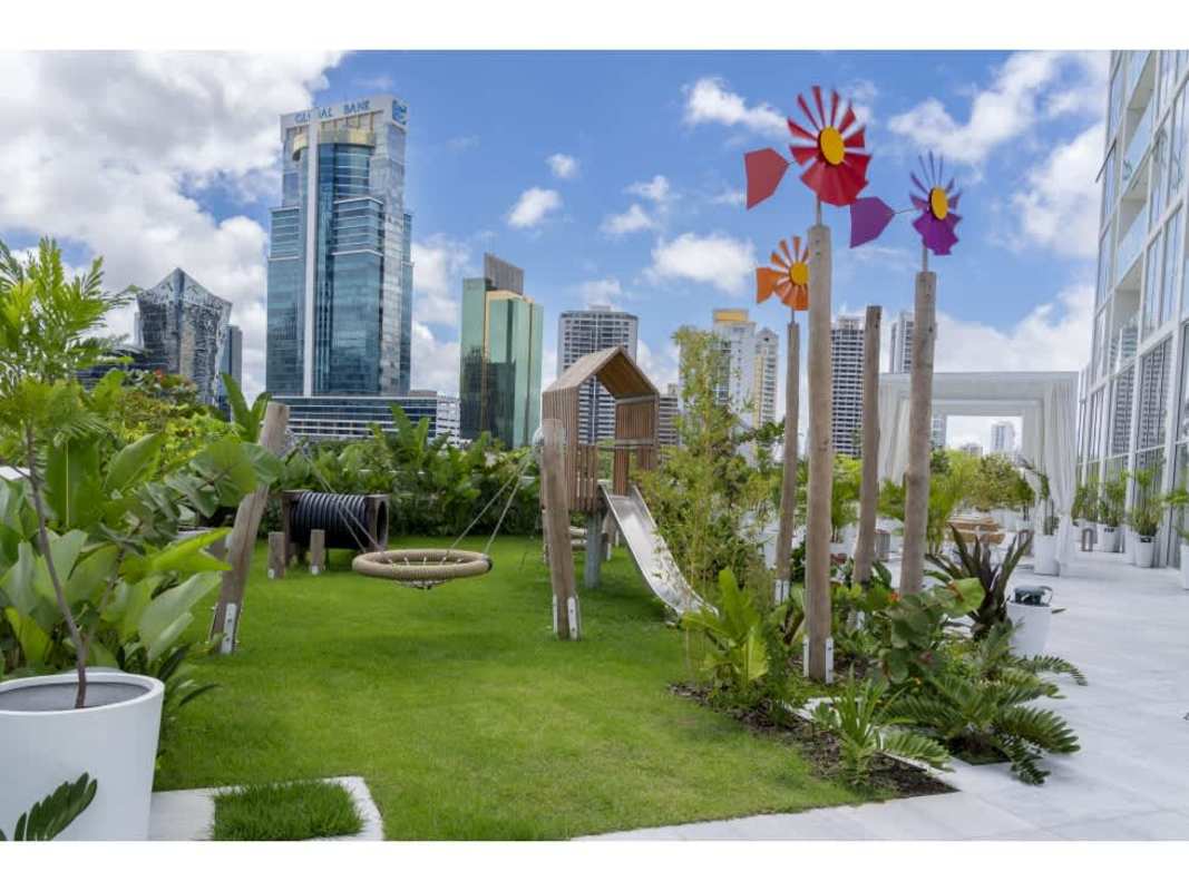 Rooftop garden and children’s playground with panoramic city skyline views PH Wanders & Yoo Avenida Balboa