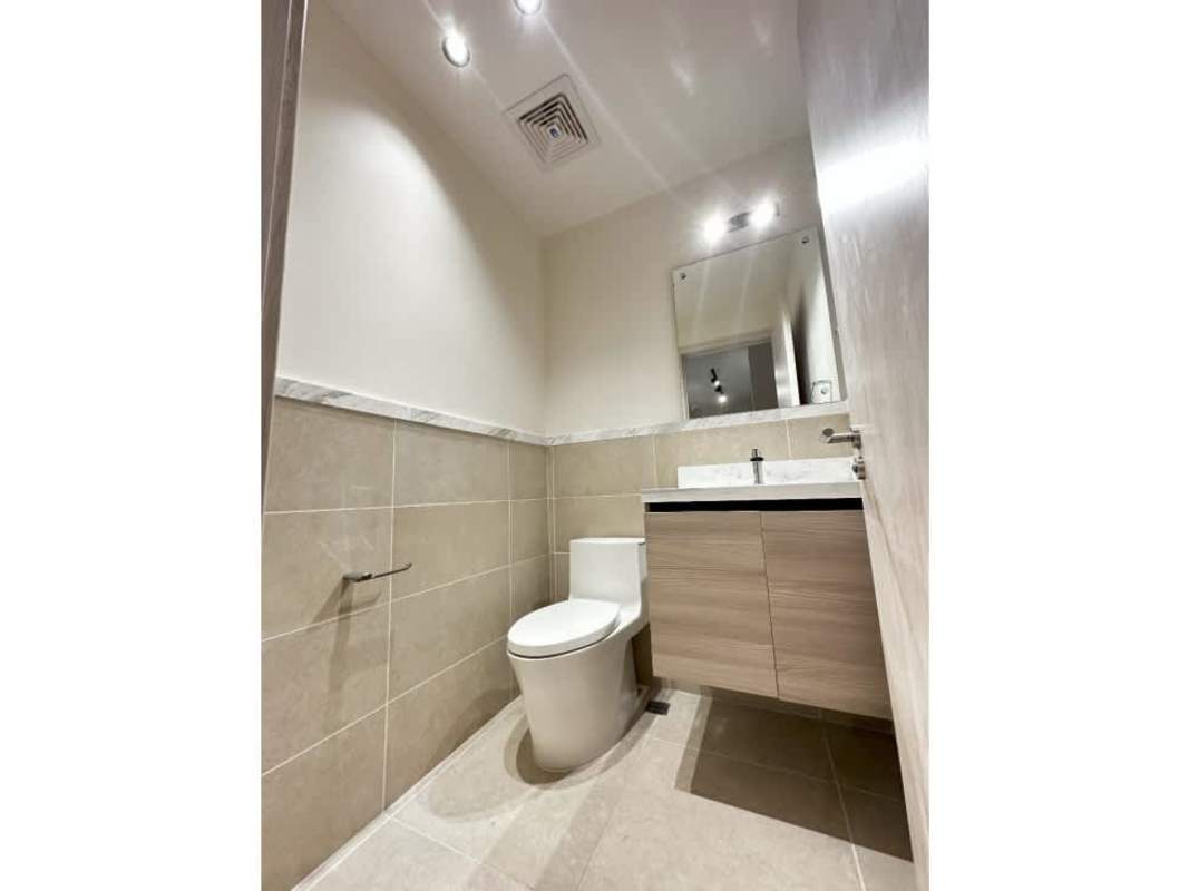 Upscale bathroom with glass shower enclosure, premium fixtures at Ocean House Santa María Panama