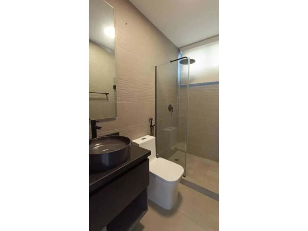 Contemporary bathroom with glass walk-in shower, sleek fixtures in PH Victory Panama